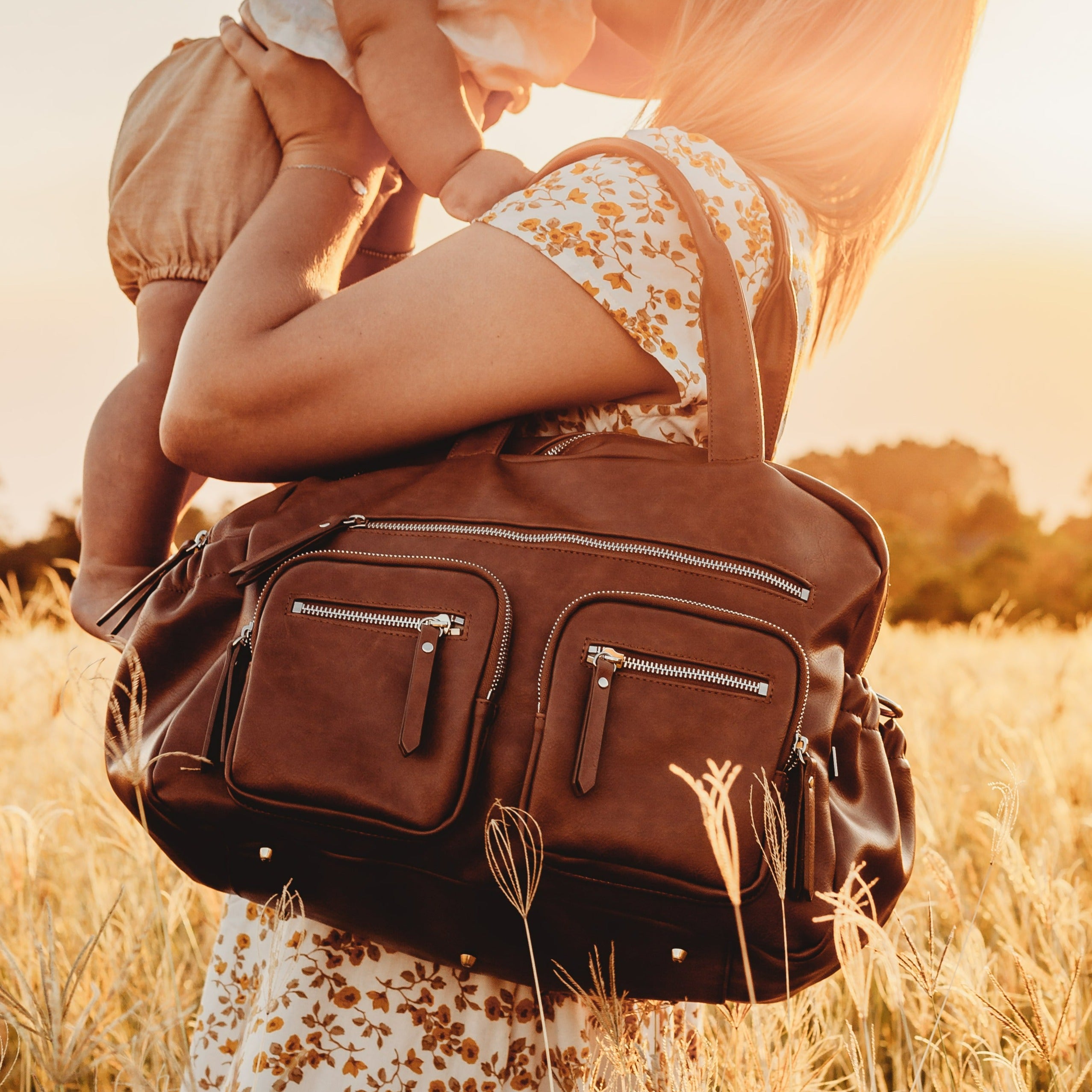 Leather store nappy bag